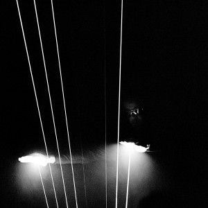 Jean-Michel Jarre playing on a laser harp at the concert.